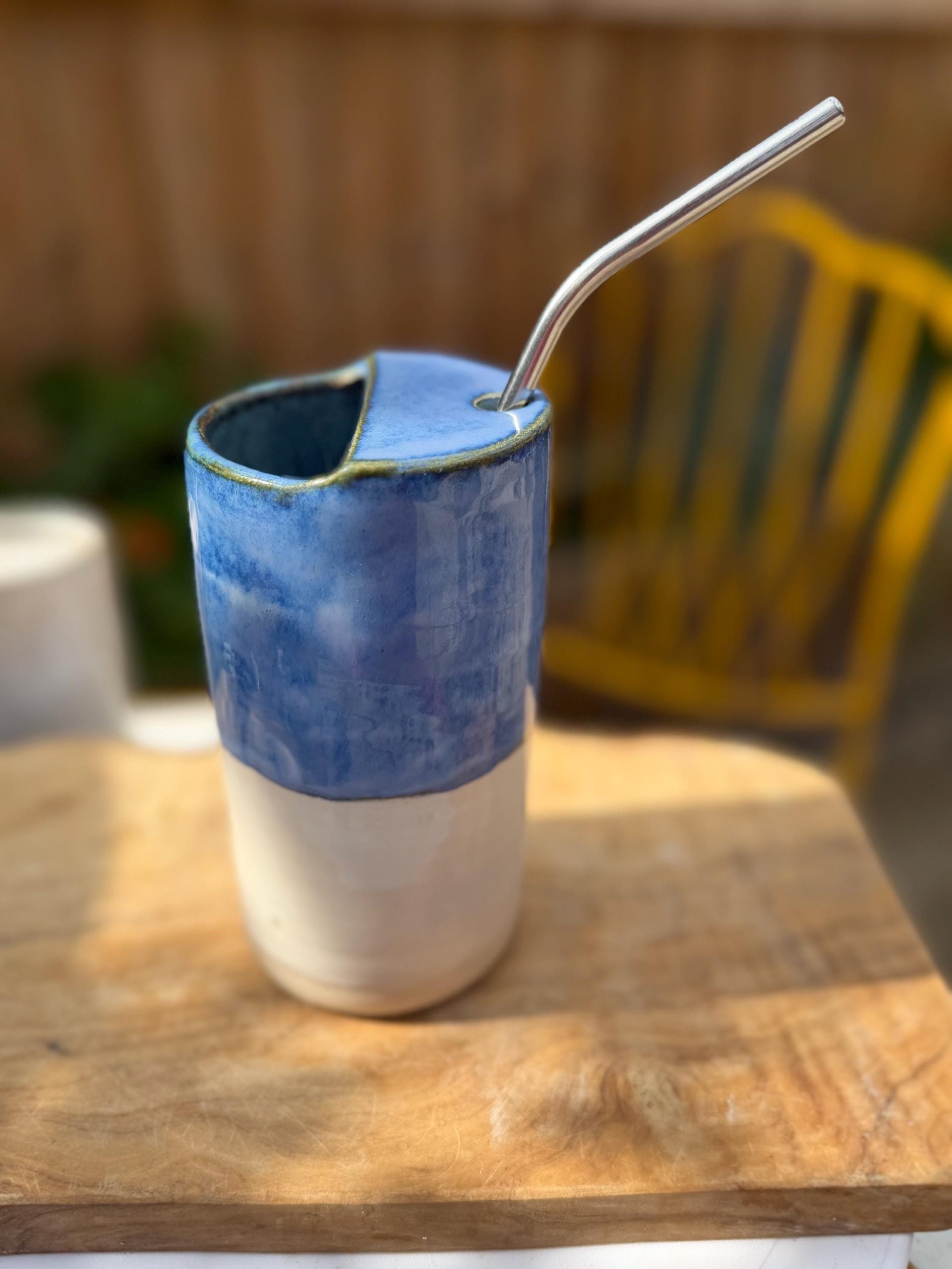 Handmade Blue Ceramic Travel Mug with House Motif & Metal Straw - Image 4
